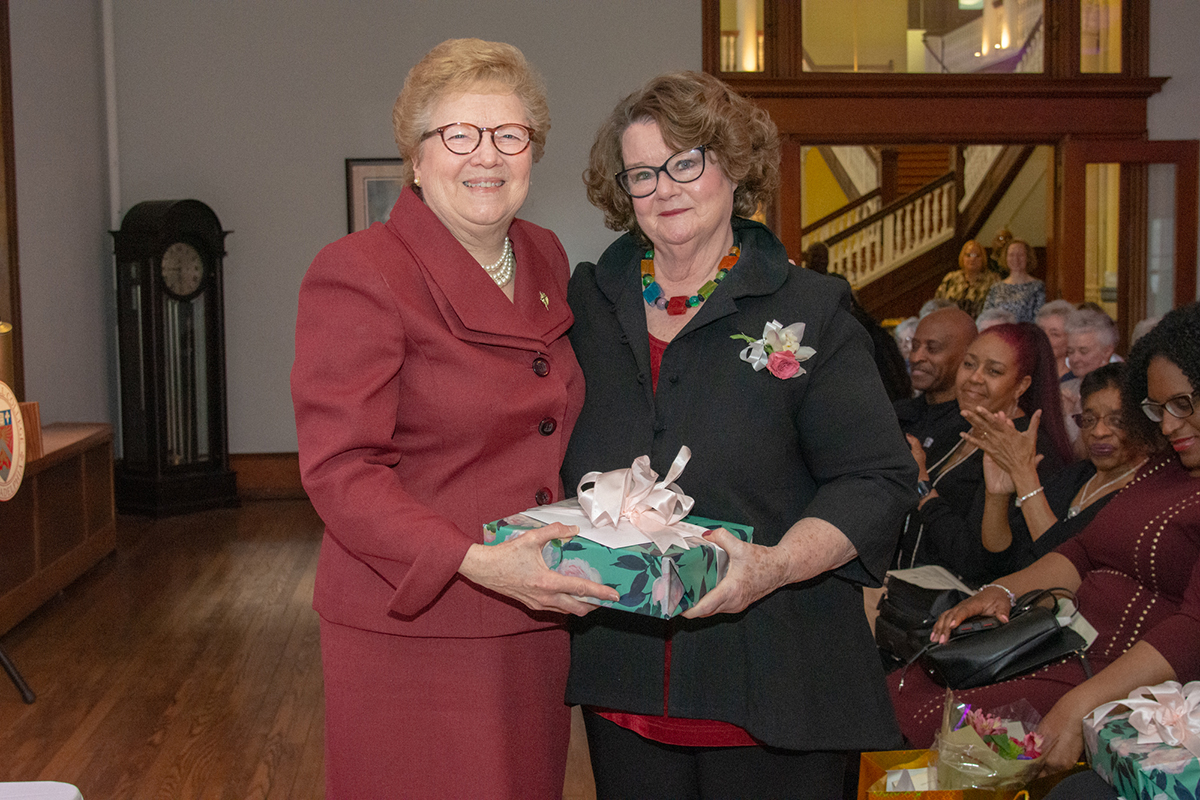 Sister Carol with Sara Kitchen, who is retiring after 34 years of service to the College.