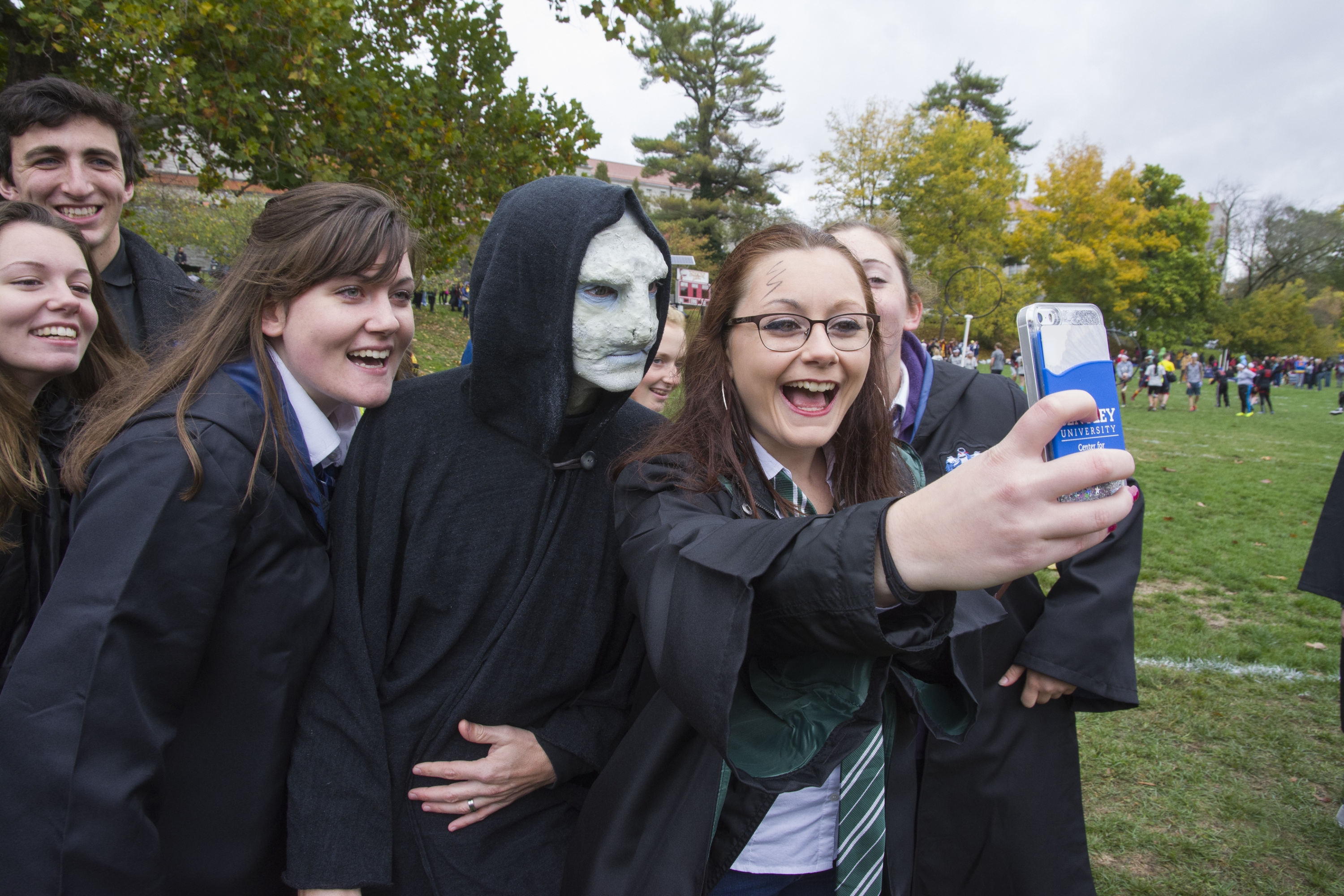 Festival goers stop to snap a quick selfie with "he who must not be named."