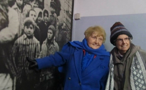 Marie Conn, right, stands with Eva Kor on a visit to Birkenau in Poland.