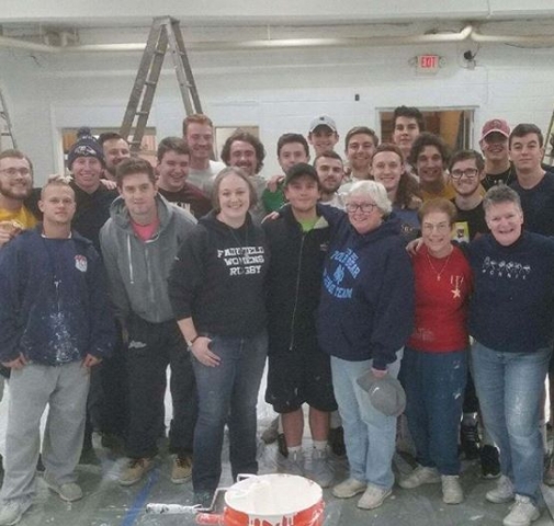 Men's lacrosse took part in the Christus Lutheran Church paint project in Camden.
