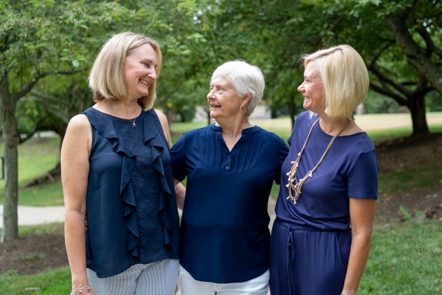 From L to R: Jodie King Smith '94, SGS '01, stands with mom, Joan Burger King '67, and sister, Julie King Gorniak '99 as the trio gather on campus.