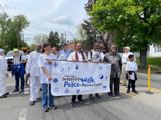 Aziz Nathoo joined other interfaith leaders during the 20th Philadelphia Interfaith Walk for Peace and Reconciliation, where he was honored for his two decades of service to this event. 