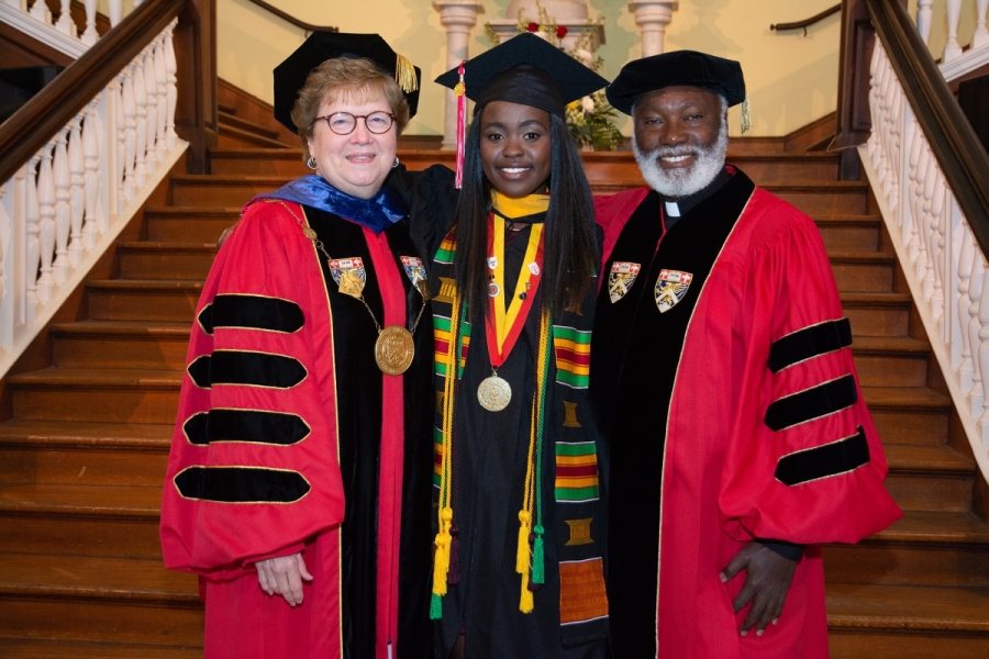 L to R: CHC President, Sister Carol Jean Vale, Mercy Thuranira '18 and Father Francis Limo Riwa