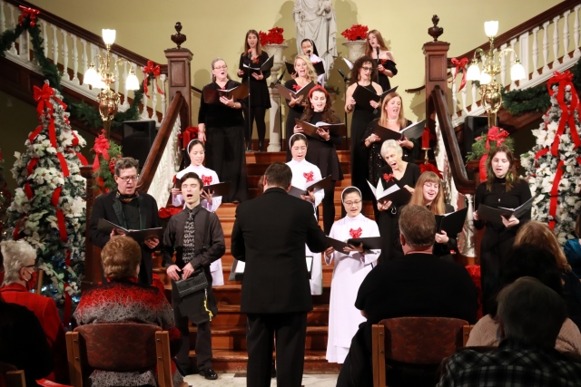 The Hill Singers, under the direction of Donald Holdren, serenaded the audience with beautiful renditions of popular Christmas hymns.