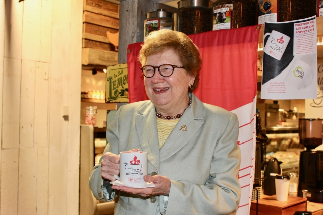 Sister Carol pictured at Poppy's Café in Chestnut Hill for the unveiling of the Sister Carol Jean Bean red velvet latte. (Photo by Margaret Terzieva)