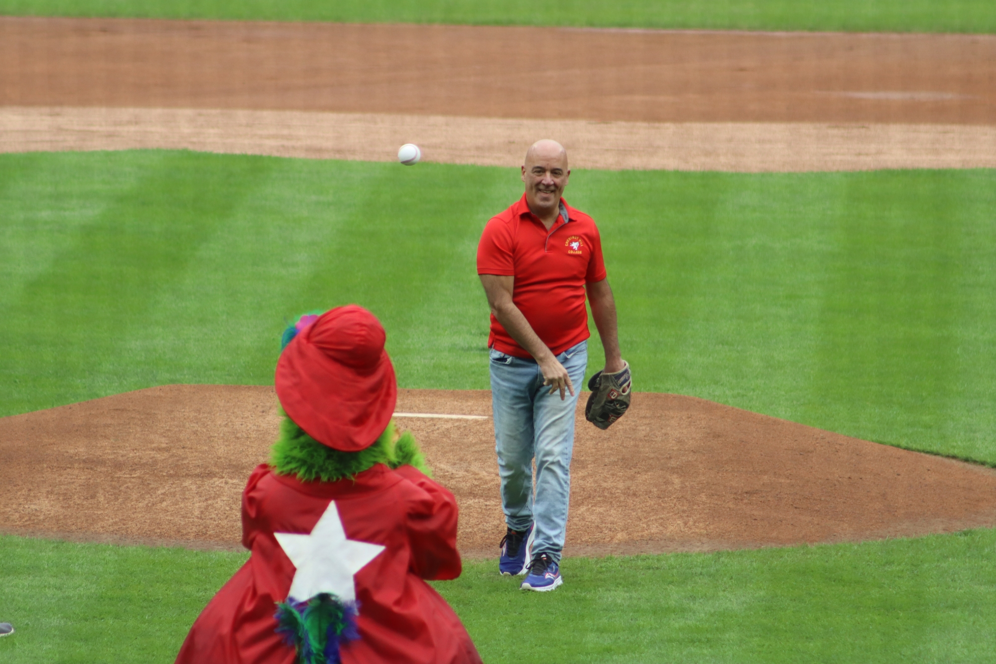 A perfect strike! In front of over 500 Griffins, Dr. Latimer throws out a first pitch to the Phillie Phanatic during CHC Night at the Phillies.