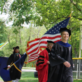 Krista Murphy leads the procession at the 2022 Commencement.