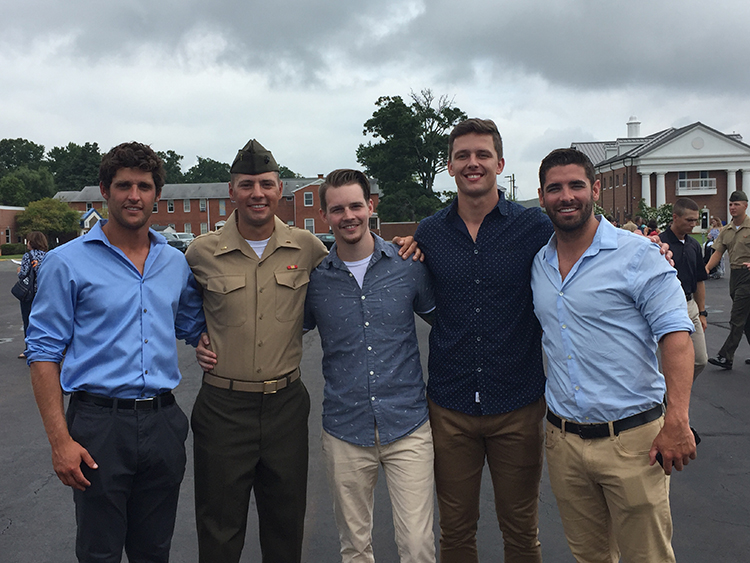 Andrei Kouzema '15 poses with friends after his graduation from Officer Candidate School.