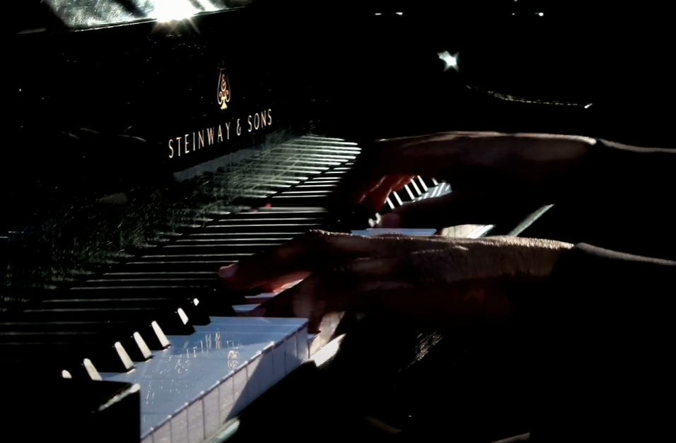 Screengrab of video of Vincent Craig's performance on one of the College's Steinway pianos.