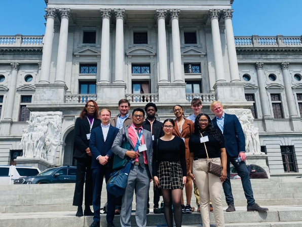 Jeffrey Carroll leads political science students on a trip to the Capitol building in Harrisburg.