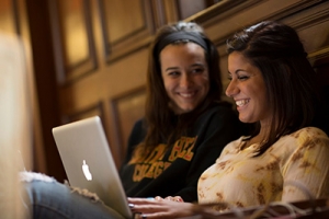 2 female students on computer