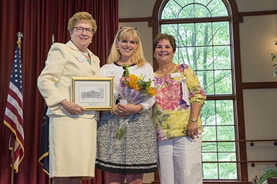 From L to R: Sister Carol Jean Vale, Ph.D, president of the College, Kathleen Shea Pie, and Margo Mongil-Kwoka, alumni association board president