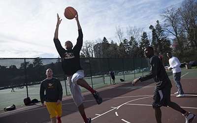 Player leaping for basketball
