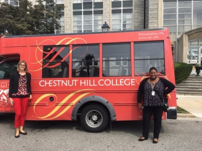 Trachanda and Gloria in front of CHC shuttle bus