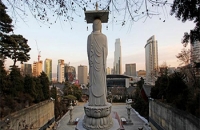 Statute overlooking the city