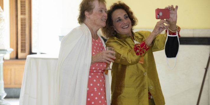 two women taking a picture