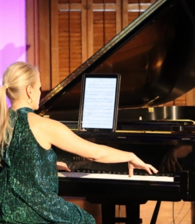 Molly Morkoski performing at piano