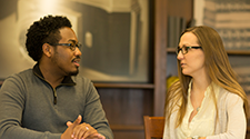 Male and Female Student talking in the masters program counseling psychology