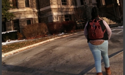 Danielle walking on campus