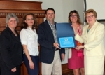 The Center's leadership team presents the Mind Matters Challenge award to Sister Carol in April. From left: Lynn Ortale, Ph.D., Meredith Kneavel, Ph.D., Bill Ernst, Psy.D., Lynn Tubman, M.Ed., and Sister Carol Jean Vale, Ph.D.