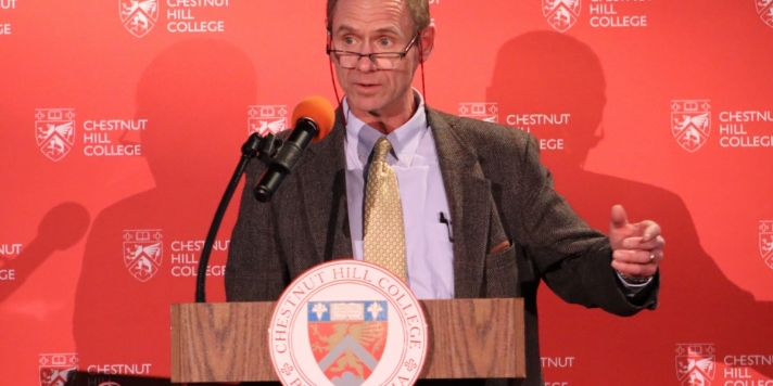 Dr. Kaminski at the podium during his lecture