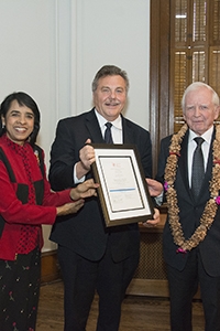 Lakshmi Atchison and Wolfgang Natter present Dr. Harald zur Hausen with a certificate of thanks. Dr. zur Hausen, a Nobel Laureate, spoke as part of the College's 23rd anniversary of the Biomedical Distinguished Lecture Series.