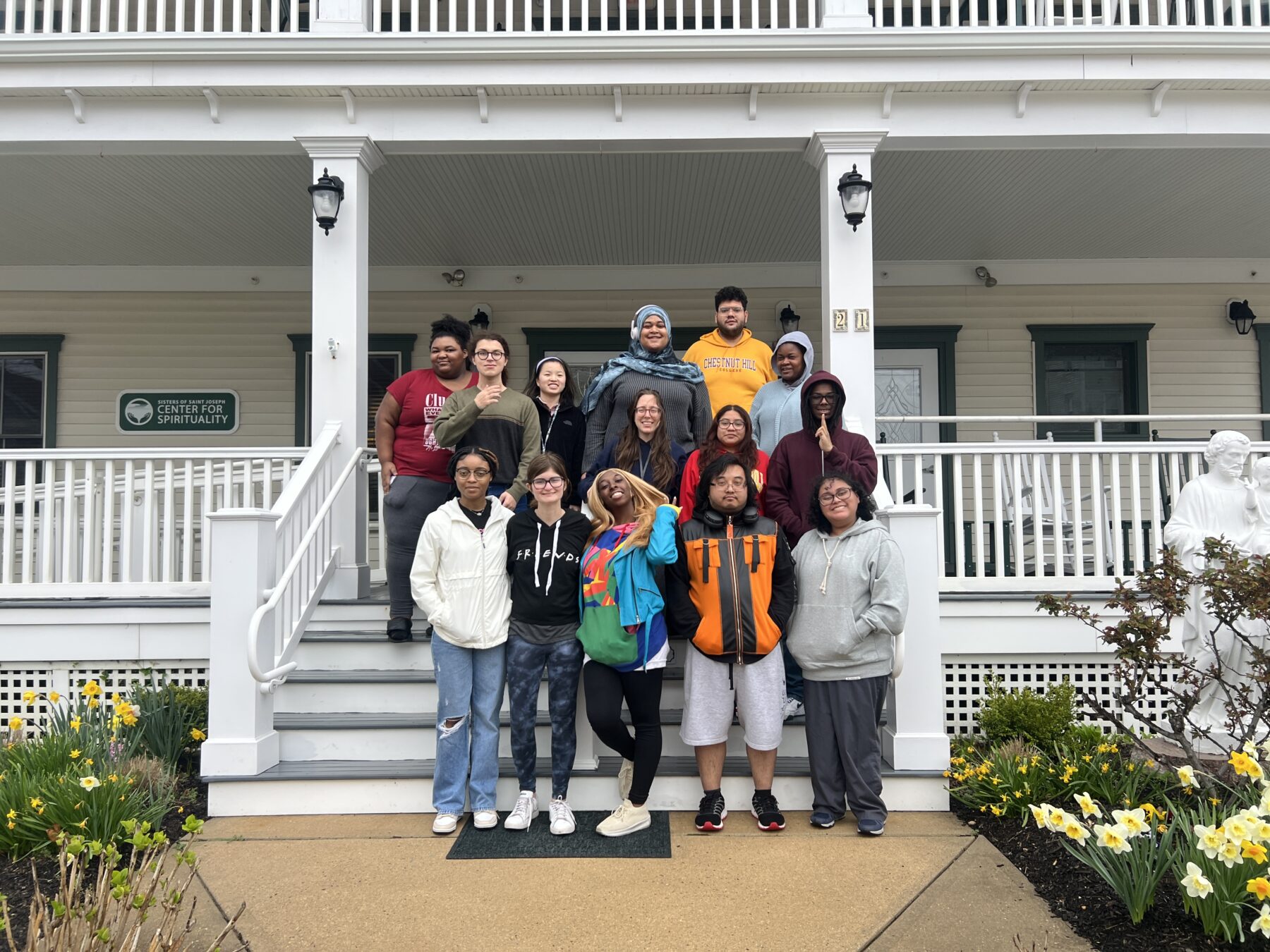 group of students outside at a service site