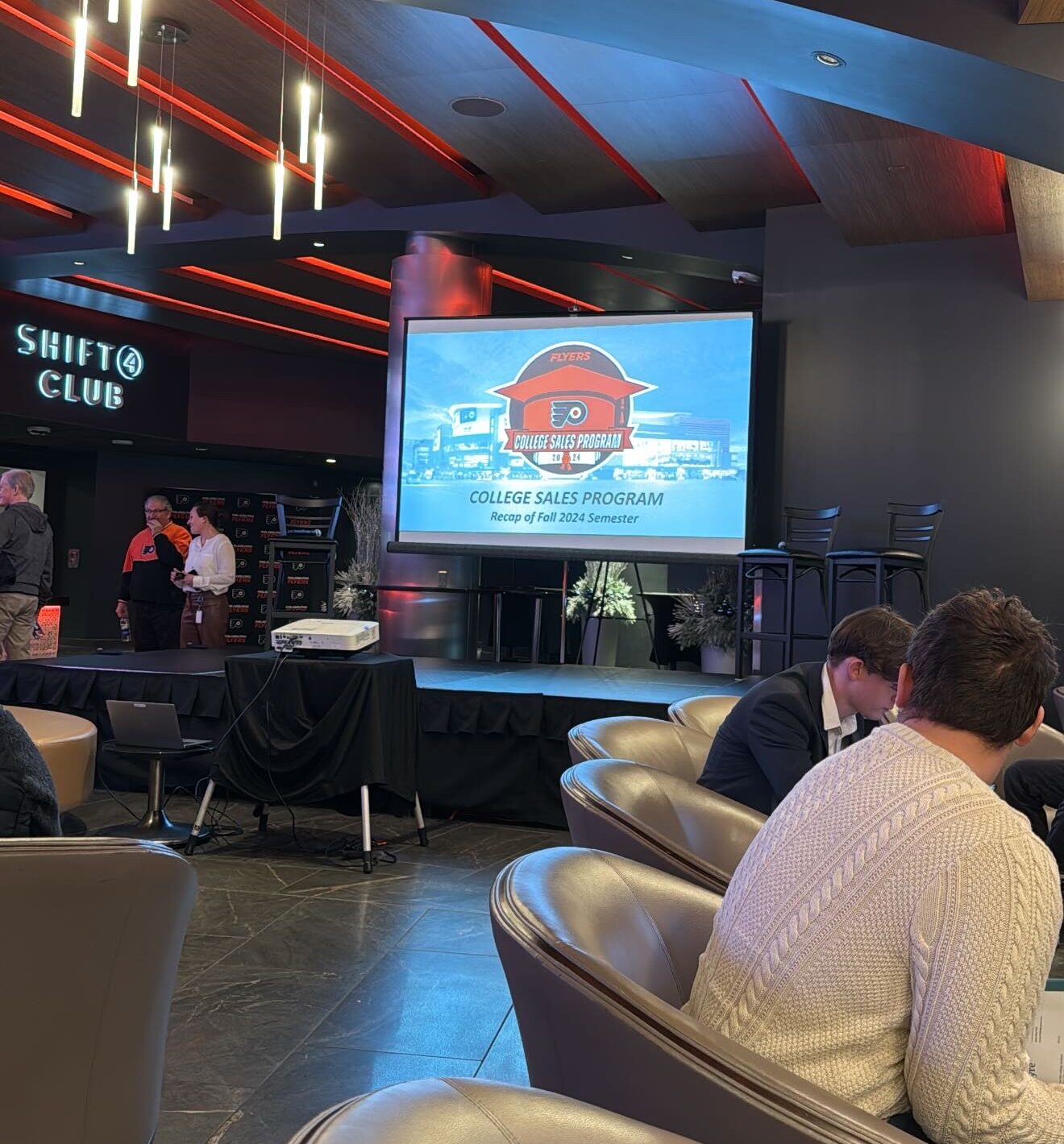 students in a room viewing a presentation